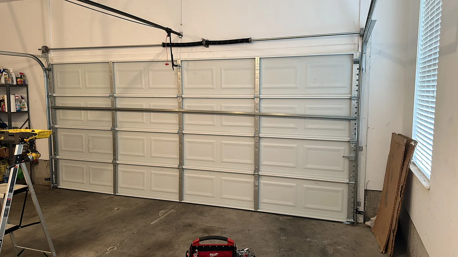 New two-car raised-panel garage door, inside view