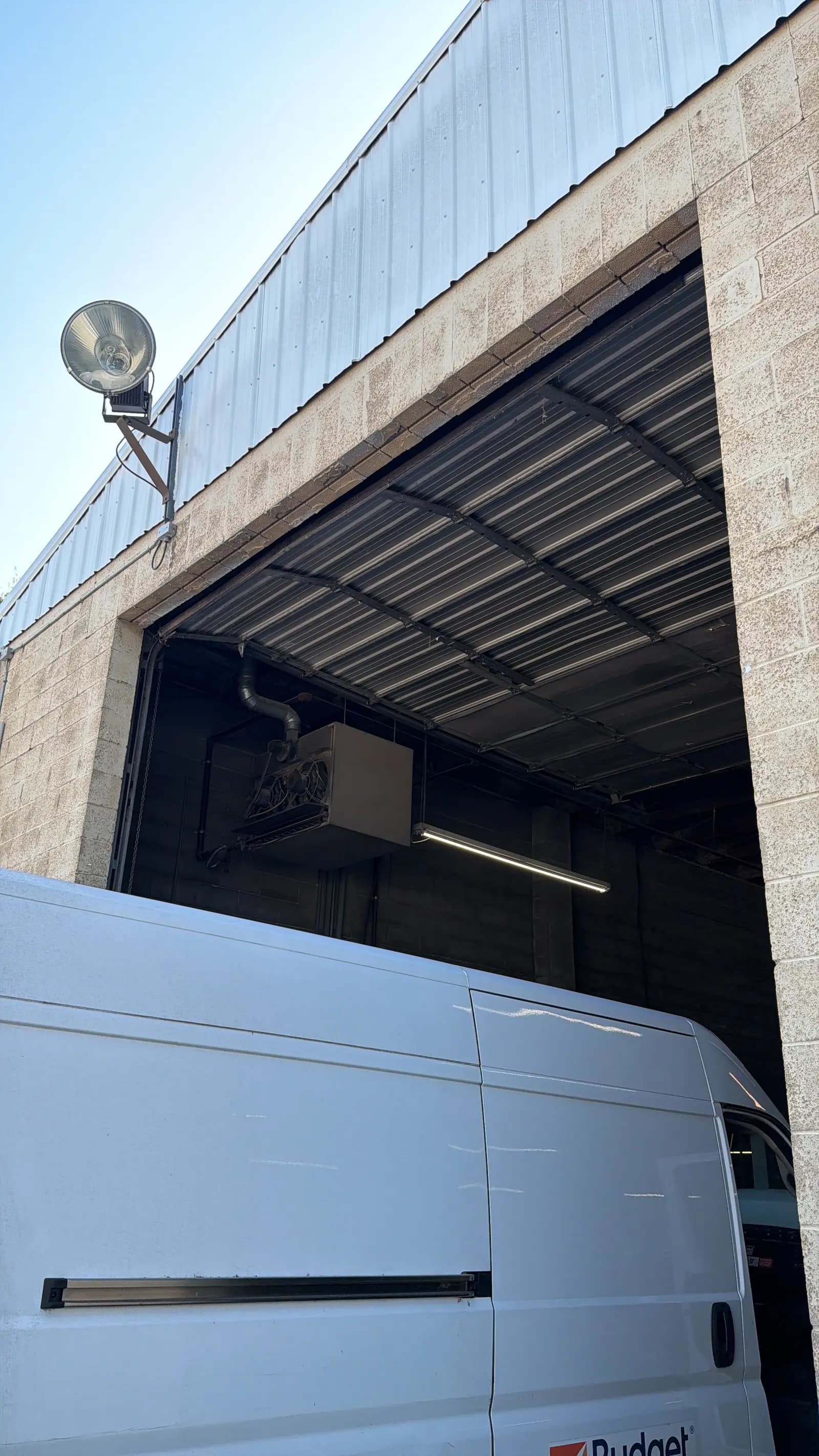 Commercial overhead door opening on a warehouse