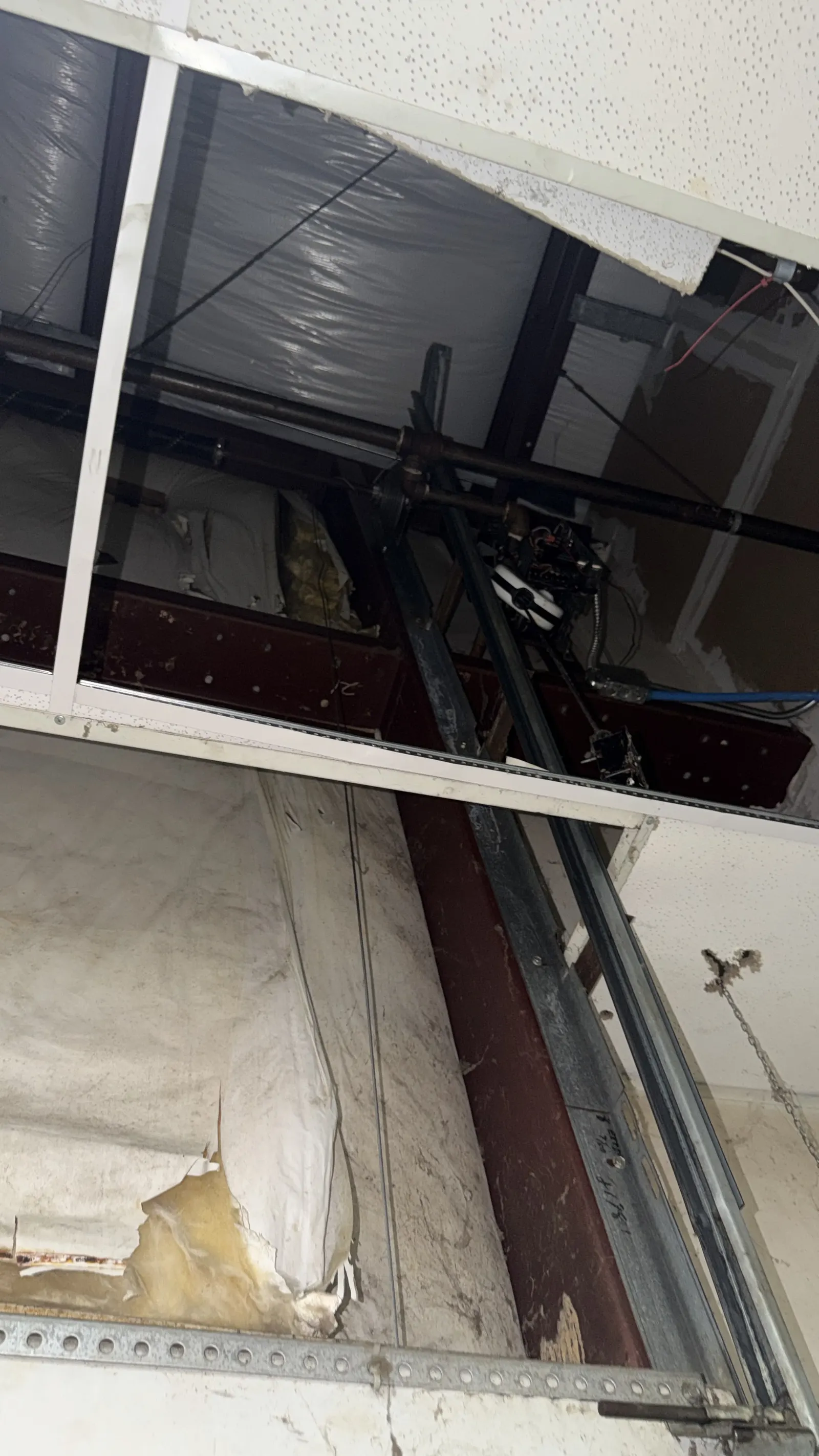 Commercial door operator and track, overhead view